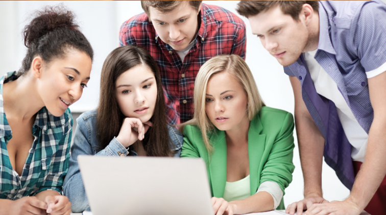 A group of Network Connex student interns collaborates on a project